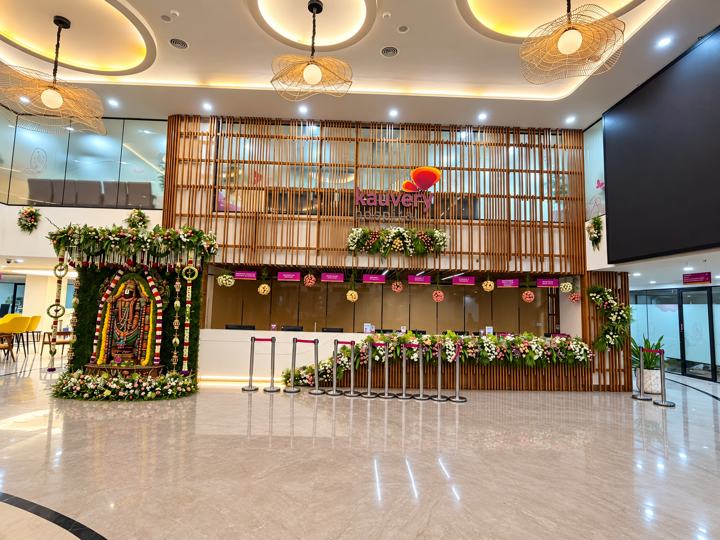 Kauvery Hospital lobby decorated for an inauguration